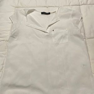 White blouse with gold details